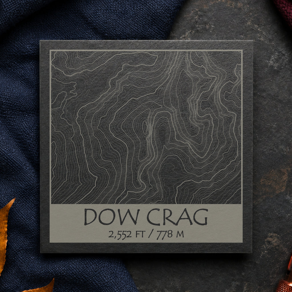 Dow Crag topographic slate coaster on dark slate with copper bracken and mountain-map details